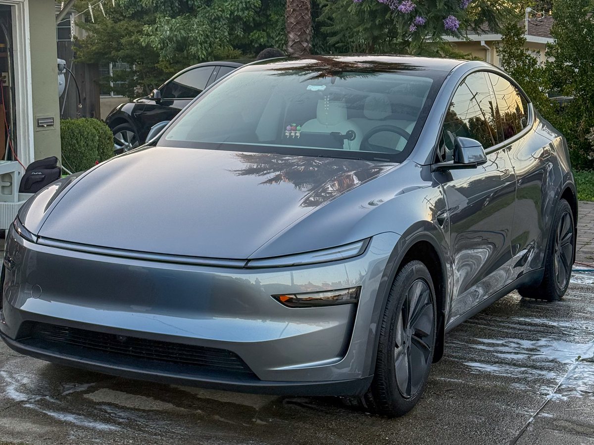 Silver Tesla after an exterior detail service